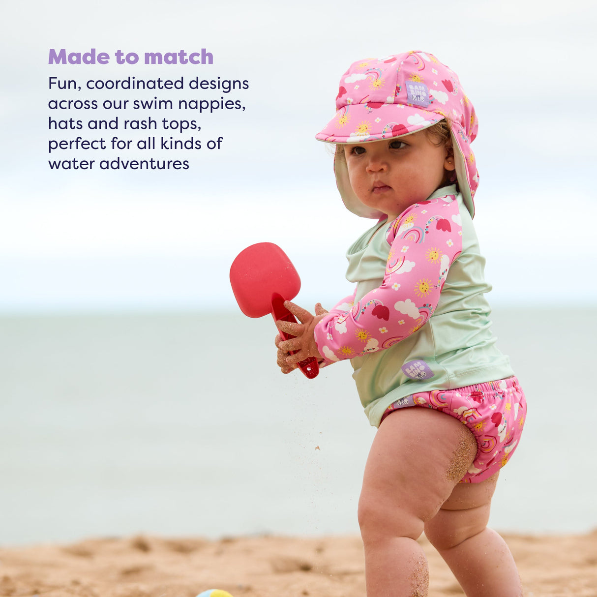 UPF 40+ Reversible Swim Hat for Babies and Toddlers in Happy Days
