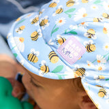 UPF 40+ Reversible Swim Hat for Babies and Toddlers in Busy Bees