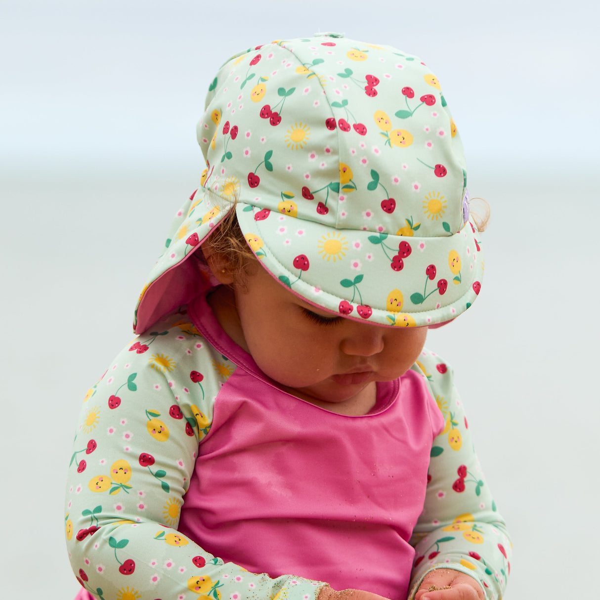 UPF 40+ Reversible Swim Hat for Babies and Toddlers in Juicy Fruit