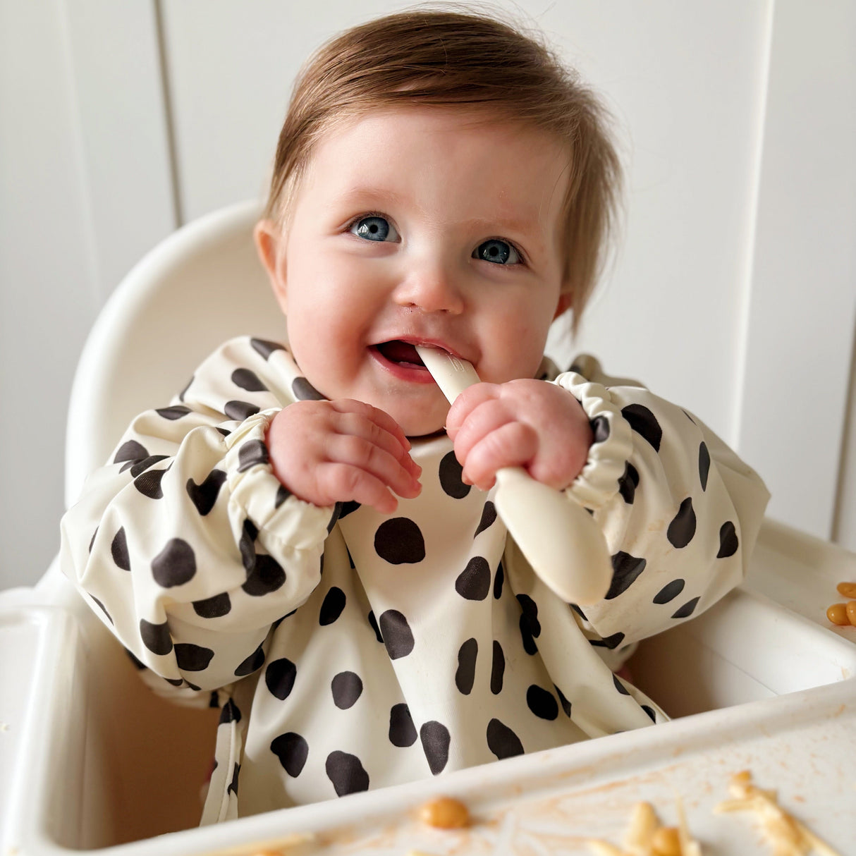 Long Sleeved Baby Bib - Spotty print