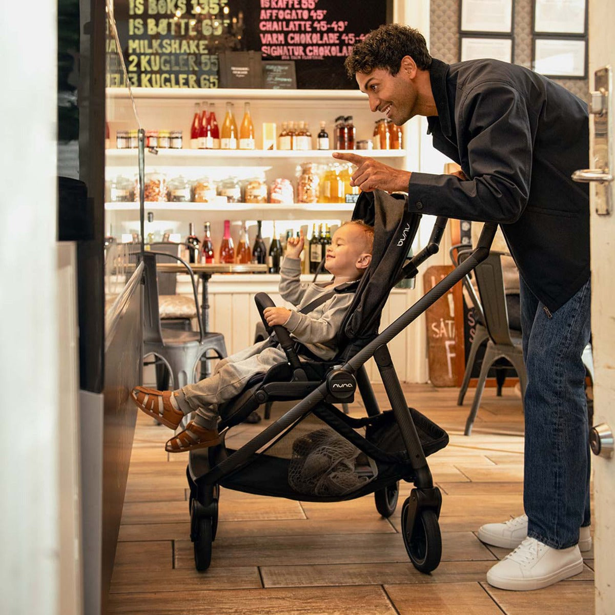 Nuna SWIV Next with ARRA Flex & Base Curv Travel System Bundle - Caviar